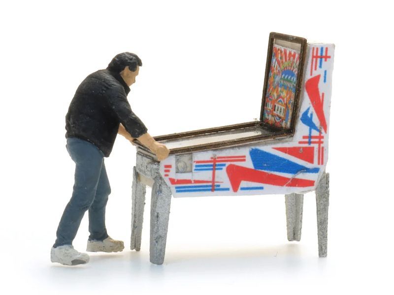 Pinball machine with figure
